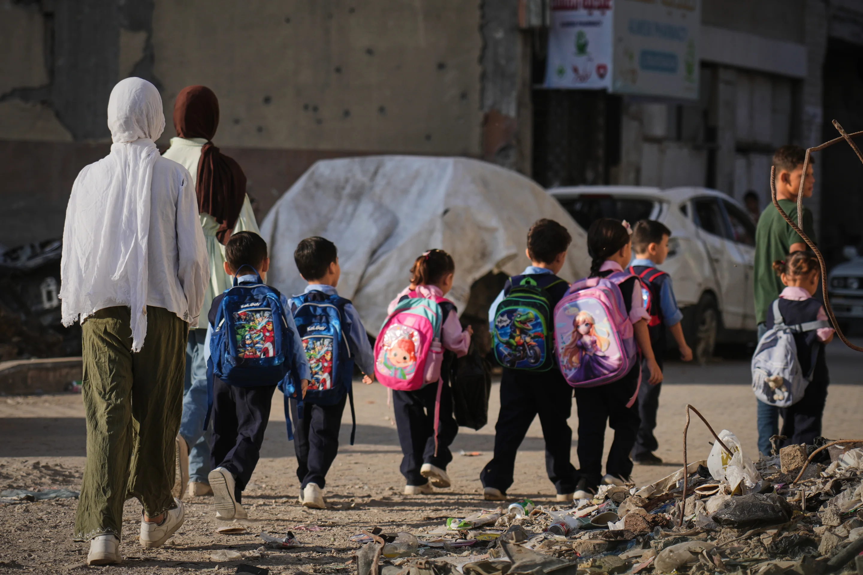 Children attending class at a school run by a charity in Gaza, where AI monitoring of lessons has been proposed.